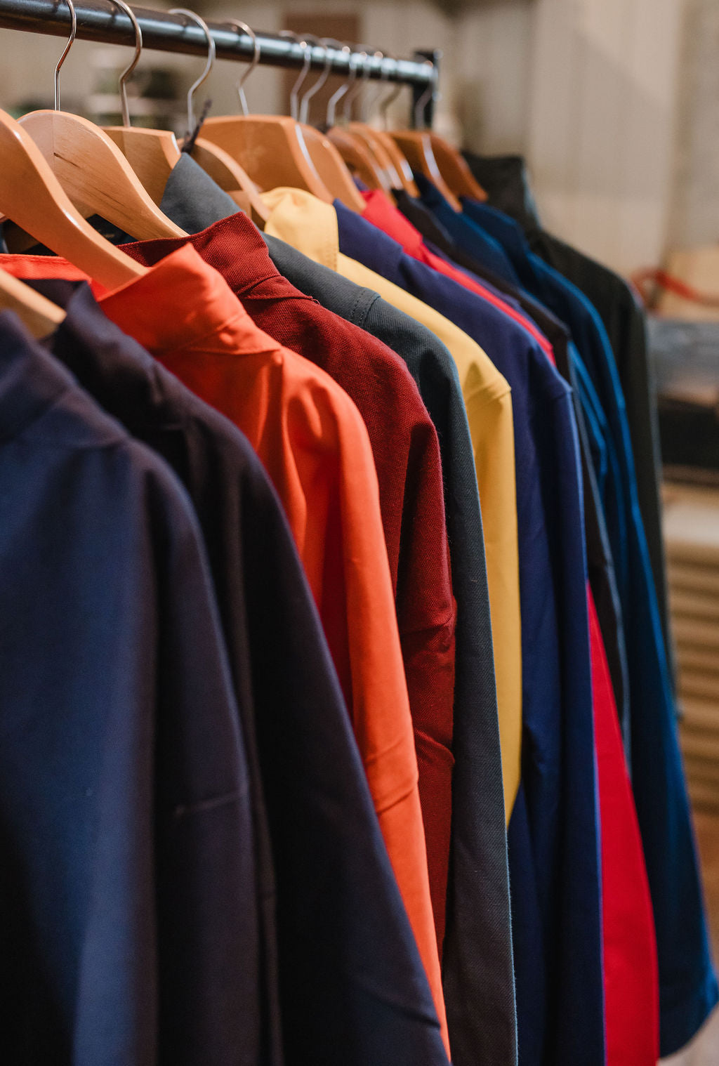 Clothing for sale at Great Dixter on a hangar.